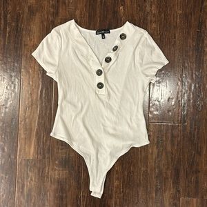 Never worn short sleeve body suit
